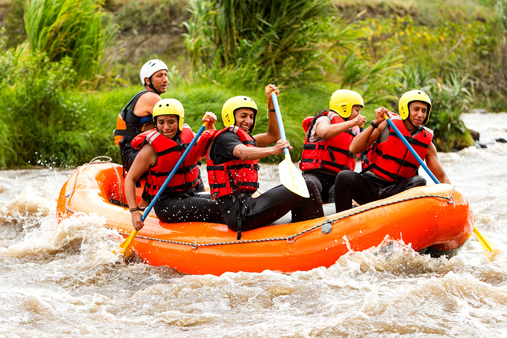 People enjoying white water rafting